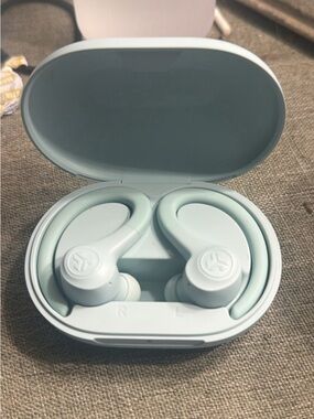 Light blue JLab Go Sport+ Wireless Earbuds with Charging Case